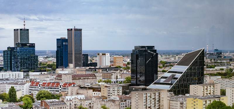 European city skyline with modern towers and historic buildings